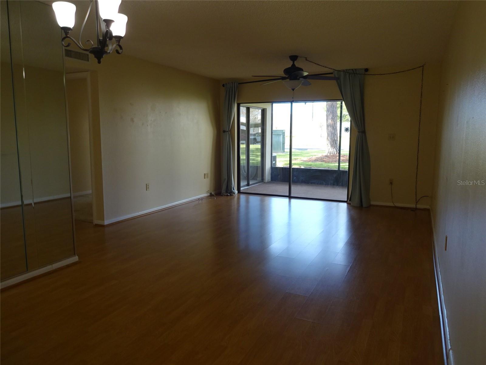 Living room...sliders going out to the screened porch