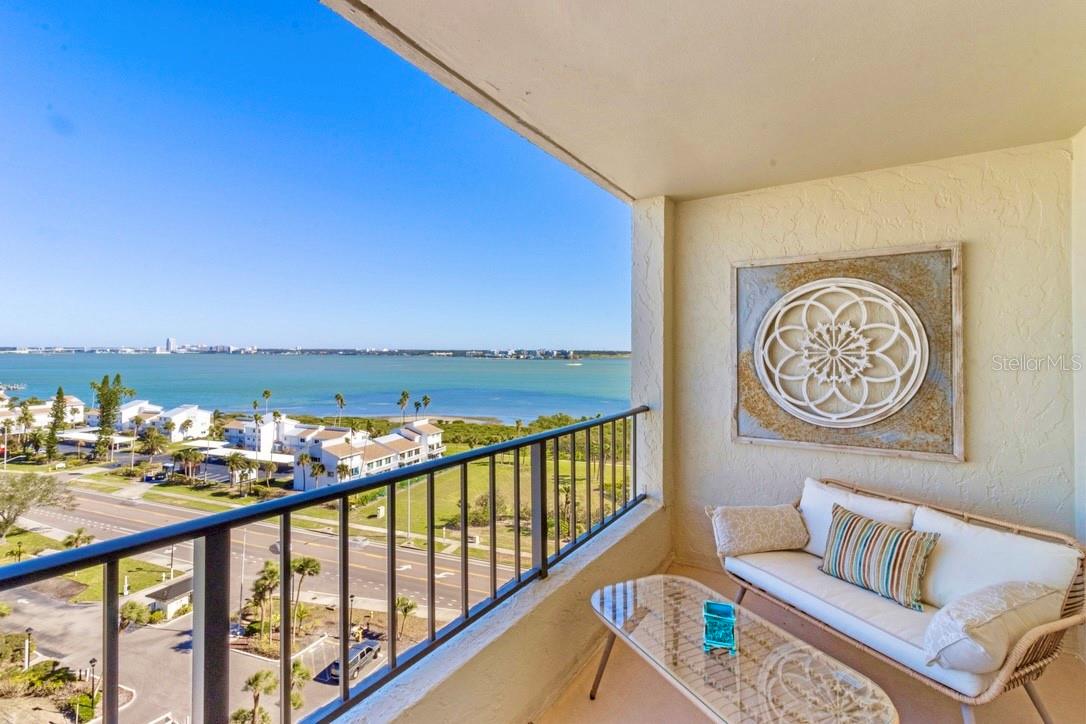 The best of both worlds with this lovely Easterly water view as well as Westerly Gulf/Beach views!