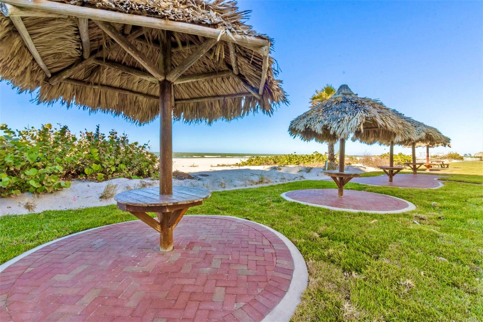 Individual Tiki huts offer a great place to meet for a bite to eat