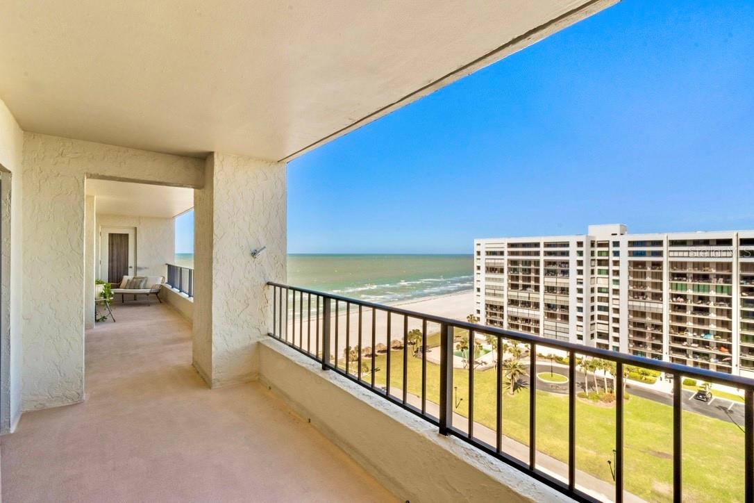 Spacious private balcony is 48 feet long- 330+SF - for coastal living at its best.