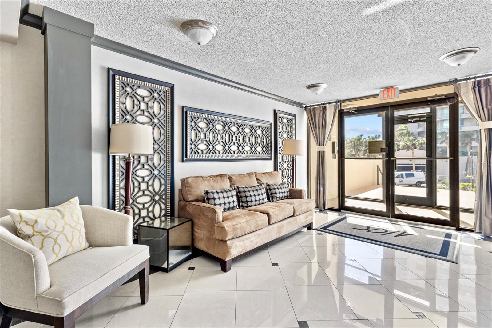 Clubhouse with Gulf beach views from terrace overlooking the pool