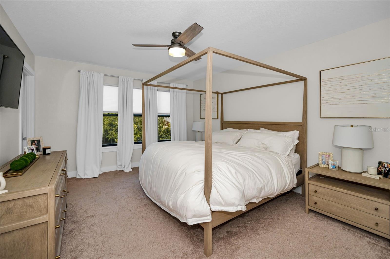 Primary Bedroom with large windows