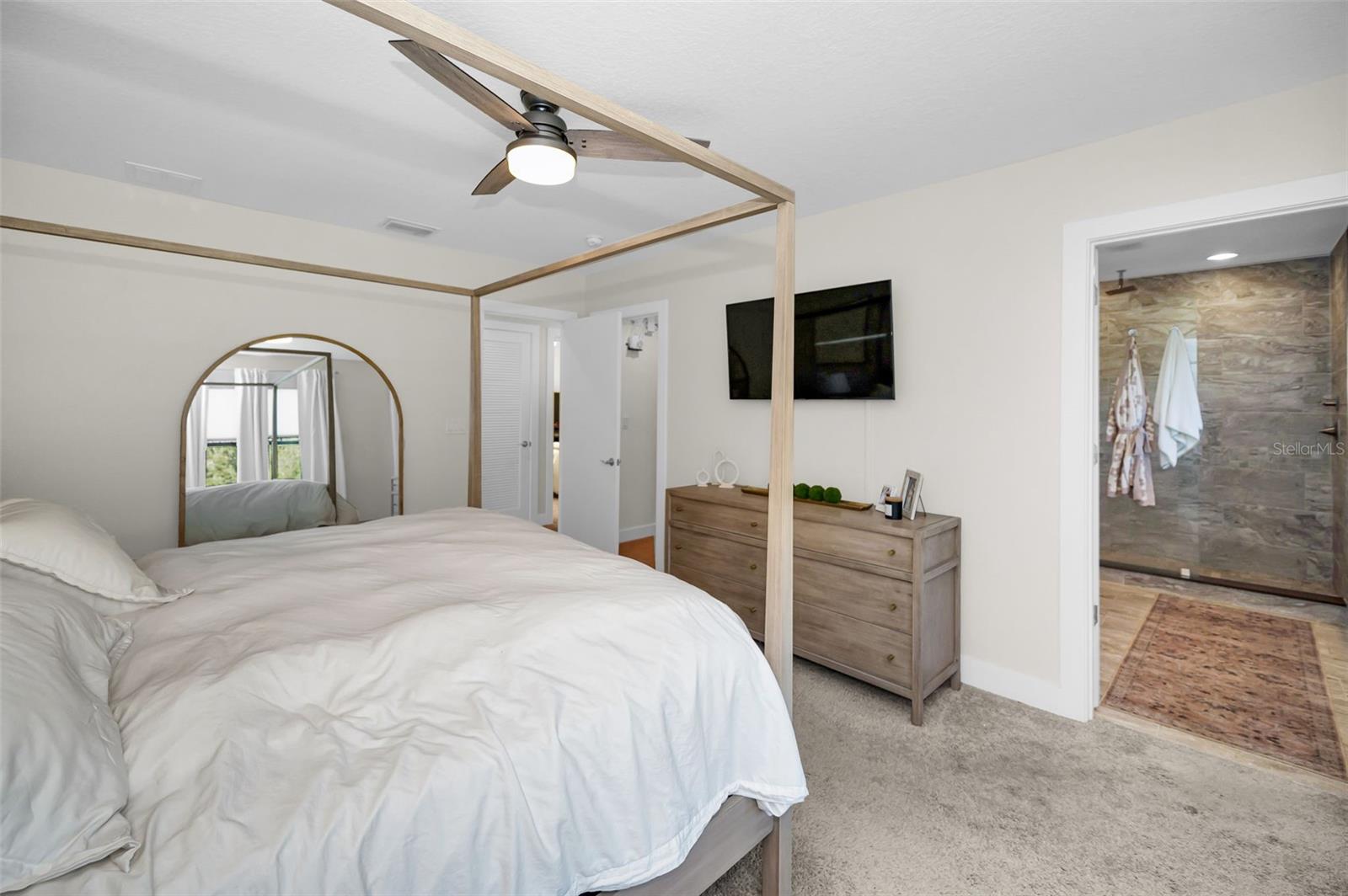 Primary bedroom with ensuite bathroom.