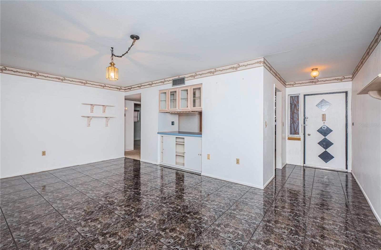 Living/dining room looking to front door