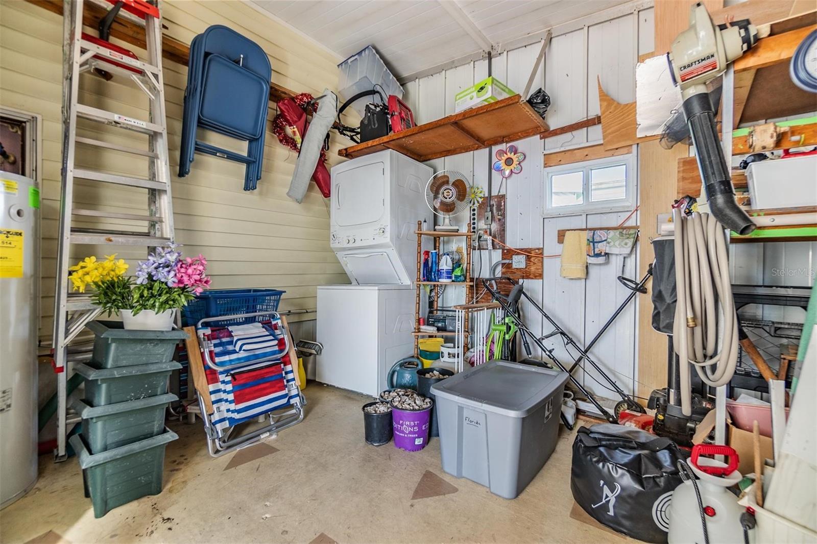 Storage shed and laundry area.