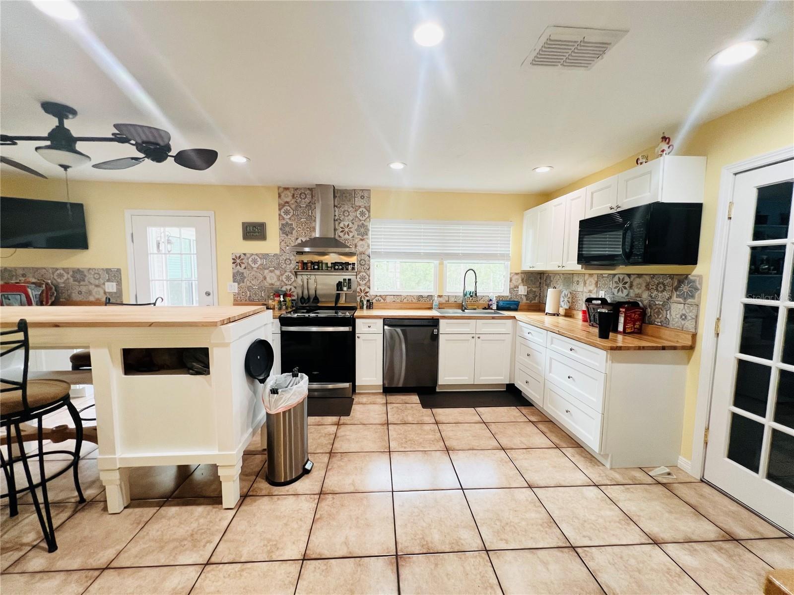 VIEW FROM DINING ROOM LOOKING INTO KITCHEN