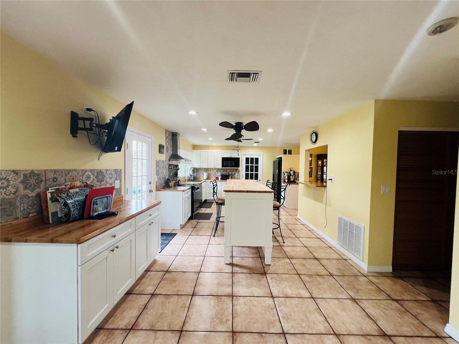 VIEW OF KITCHEN FROM BREAKFAST AREA