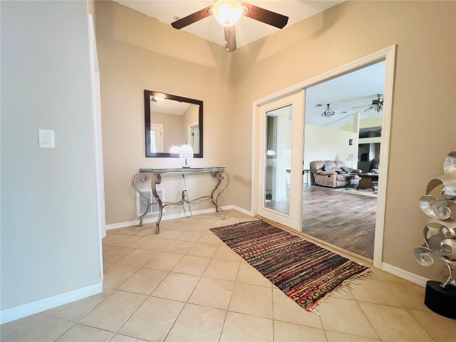 ENTRANCE TO IN LAW SUITE, RENTAL, MASTER BEDROOM 2 LOCATED ABOVE GARAGE OPPOSITE SIDE OF POOL AND OTHER LARGE ROOM