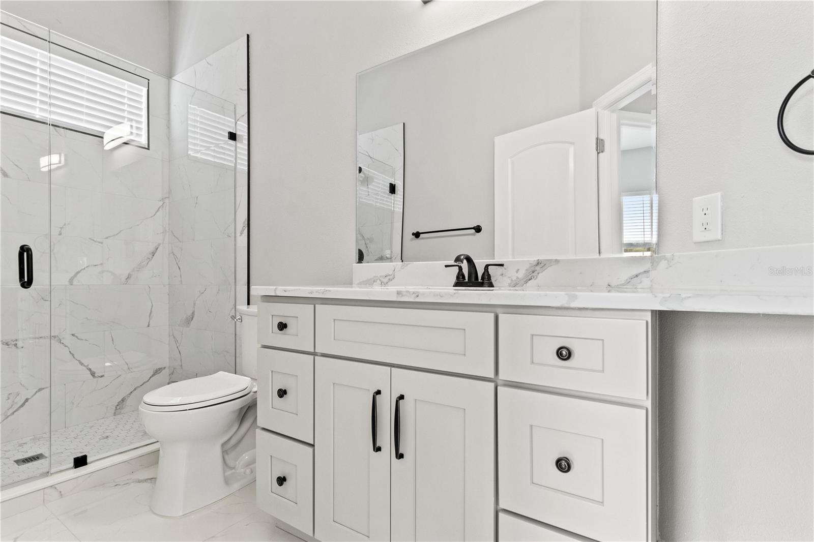 Guest bathroom w/shower view 2