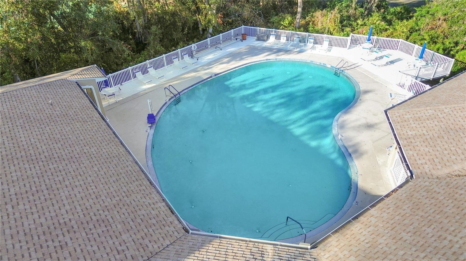 club house aerial view of pool