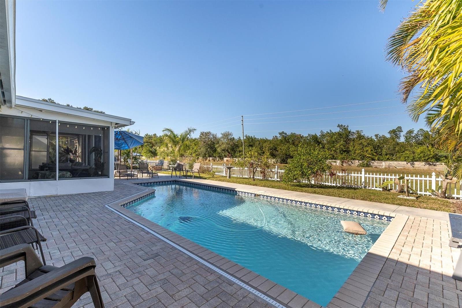 Huge field behind this house - toss a football - let the kids play - its fenced and secure.