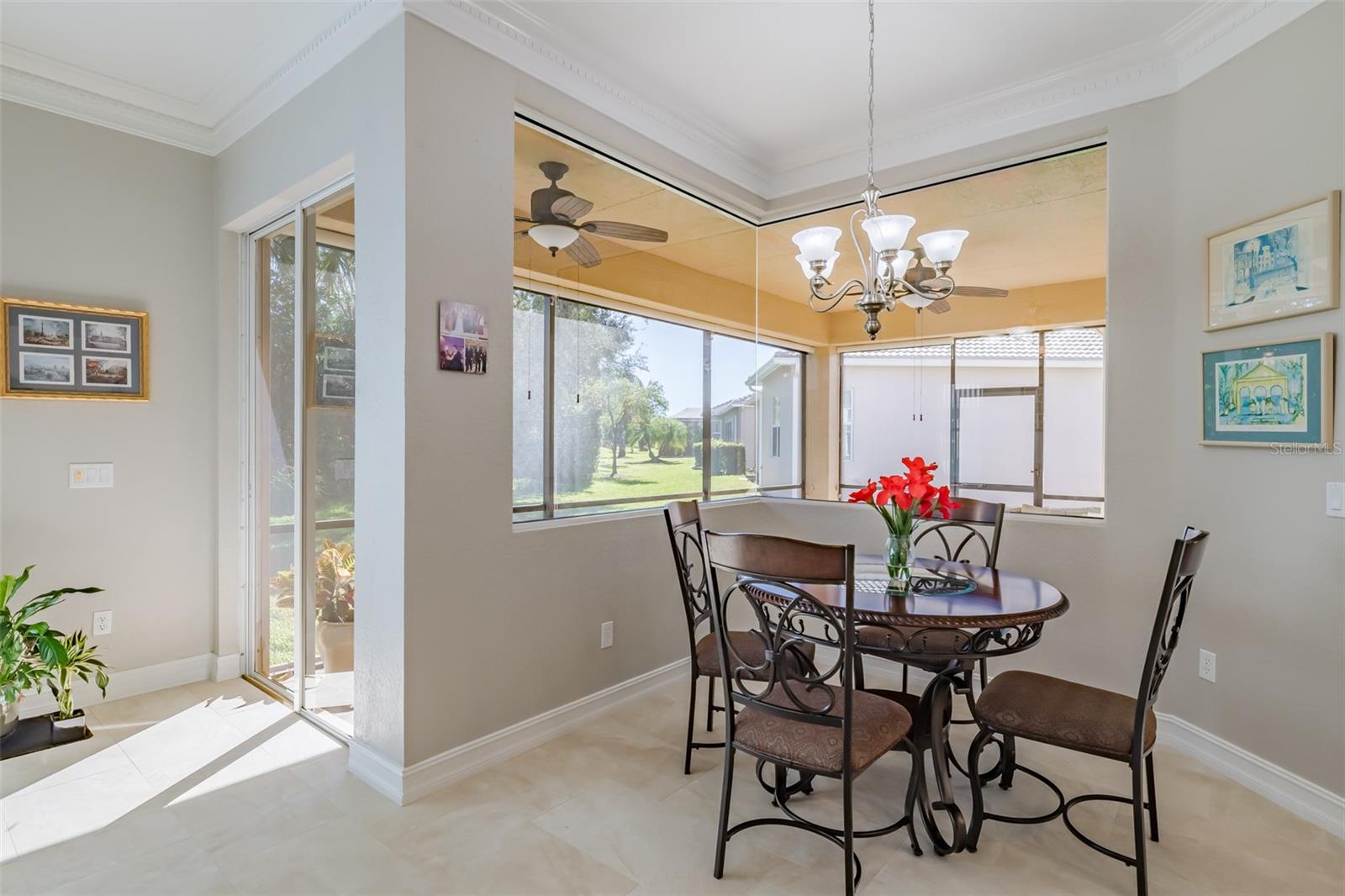 Casual Dining Area with zero corner windows overlooking Lanai