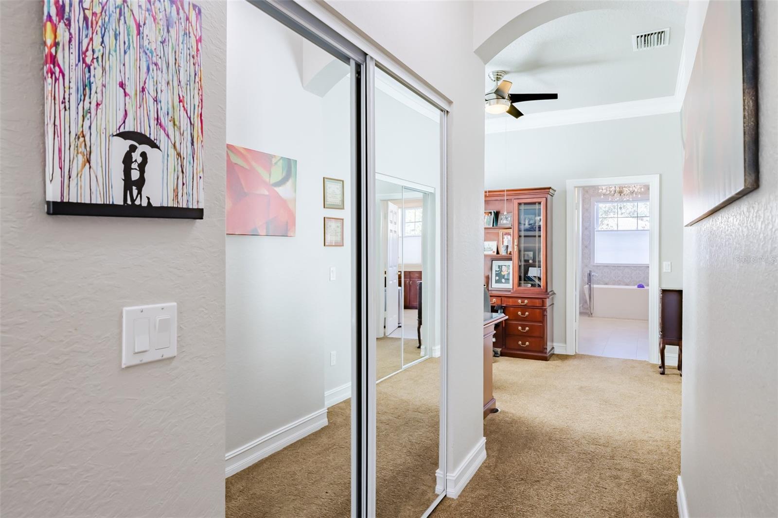 Walk in Closet in hallway from Primary Bedroom to Primary Retreat