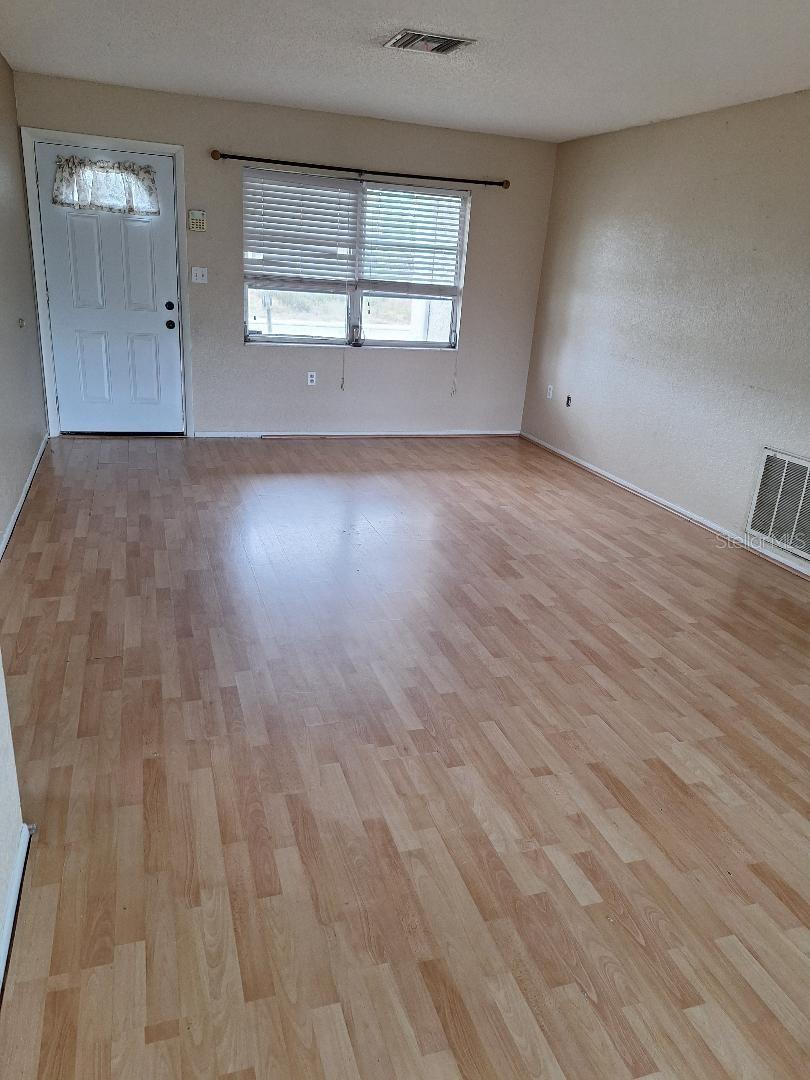 Living area looking at front door