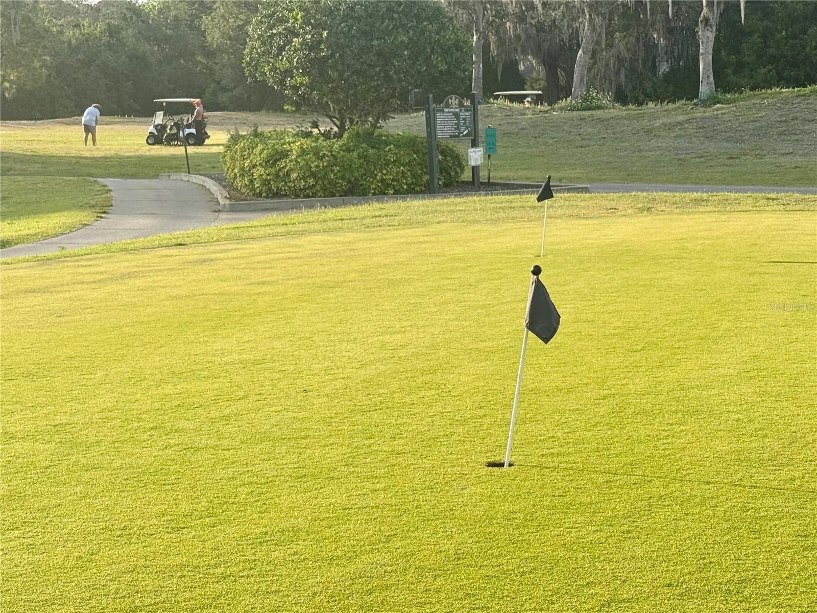 Putting green by Clubhouse