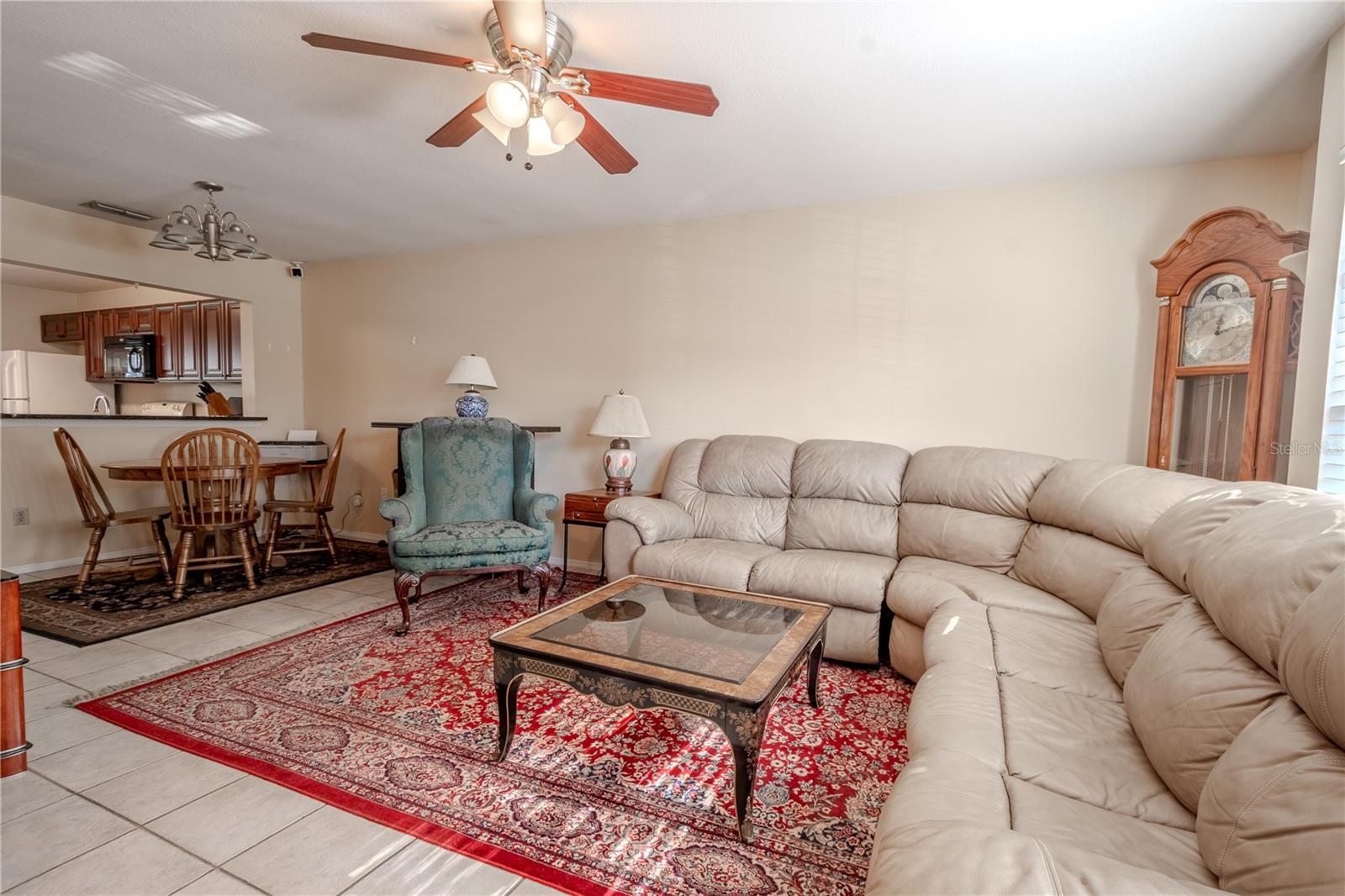 The living room is open to the dining area and kitchen in this open and inviting floor plan.