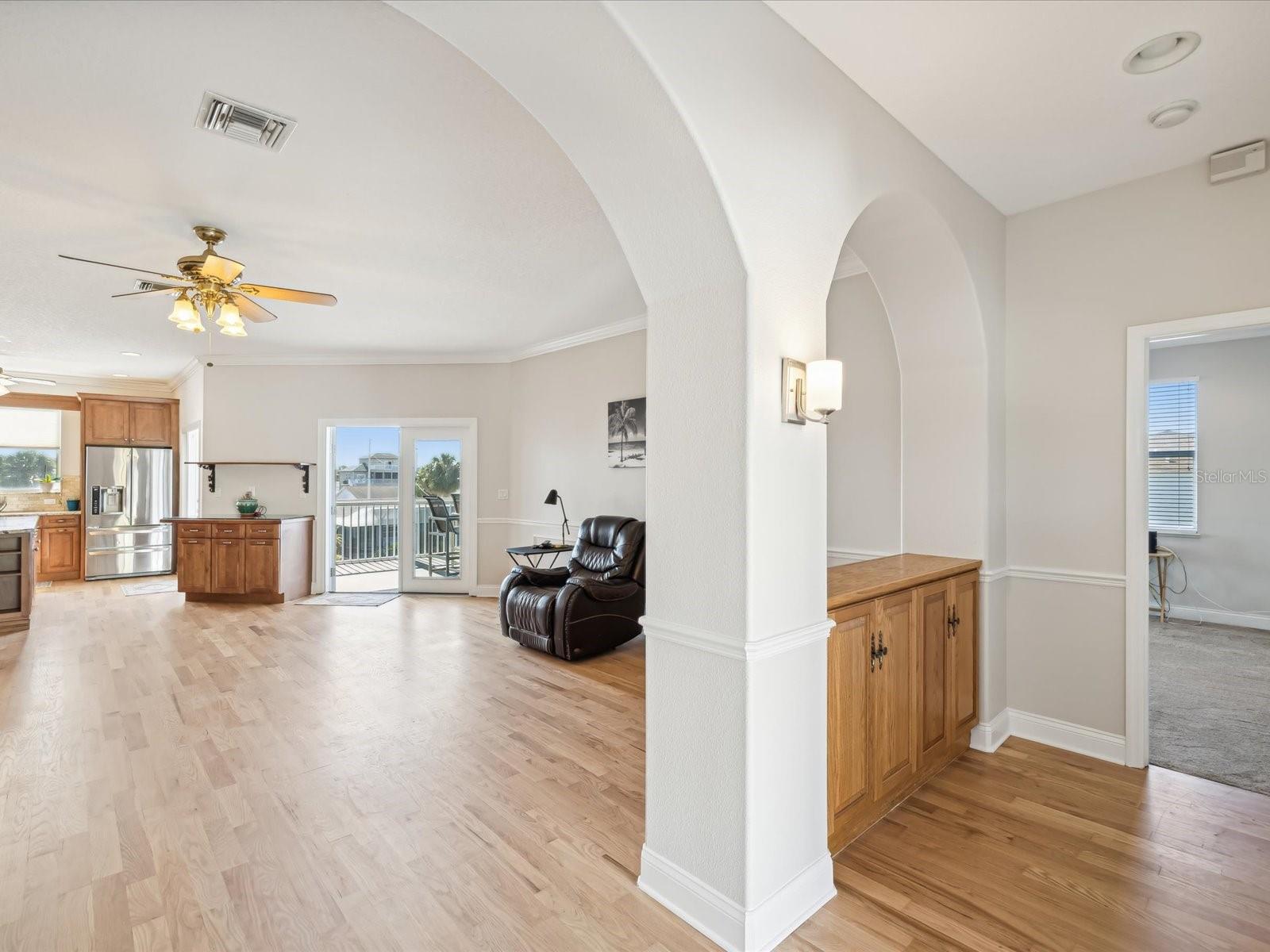 Foyer, Open Floor plan with primary bedroom to the right and beds 2 and 3 to the left of the dining room.