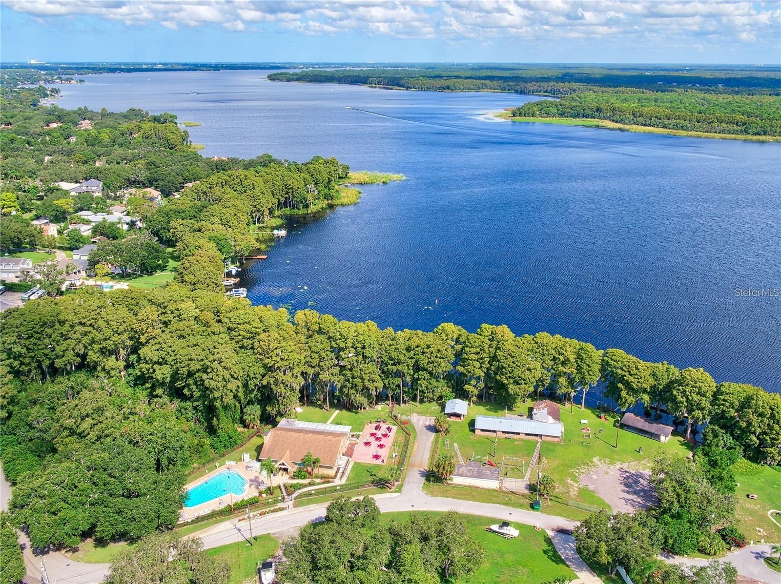 Frontage on magnificent Lake Tarpon and within minutes of Gulf Coast beaches, but Highland Lakes' elevation makes it high & dry above the flood hazard zone~