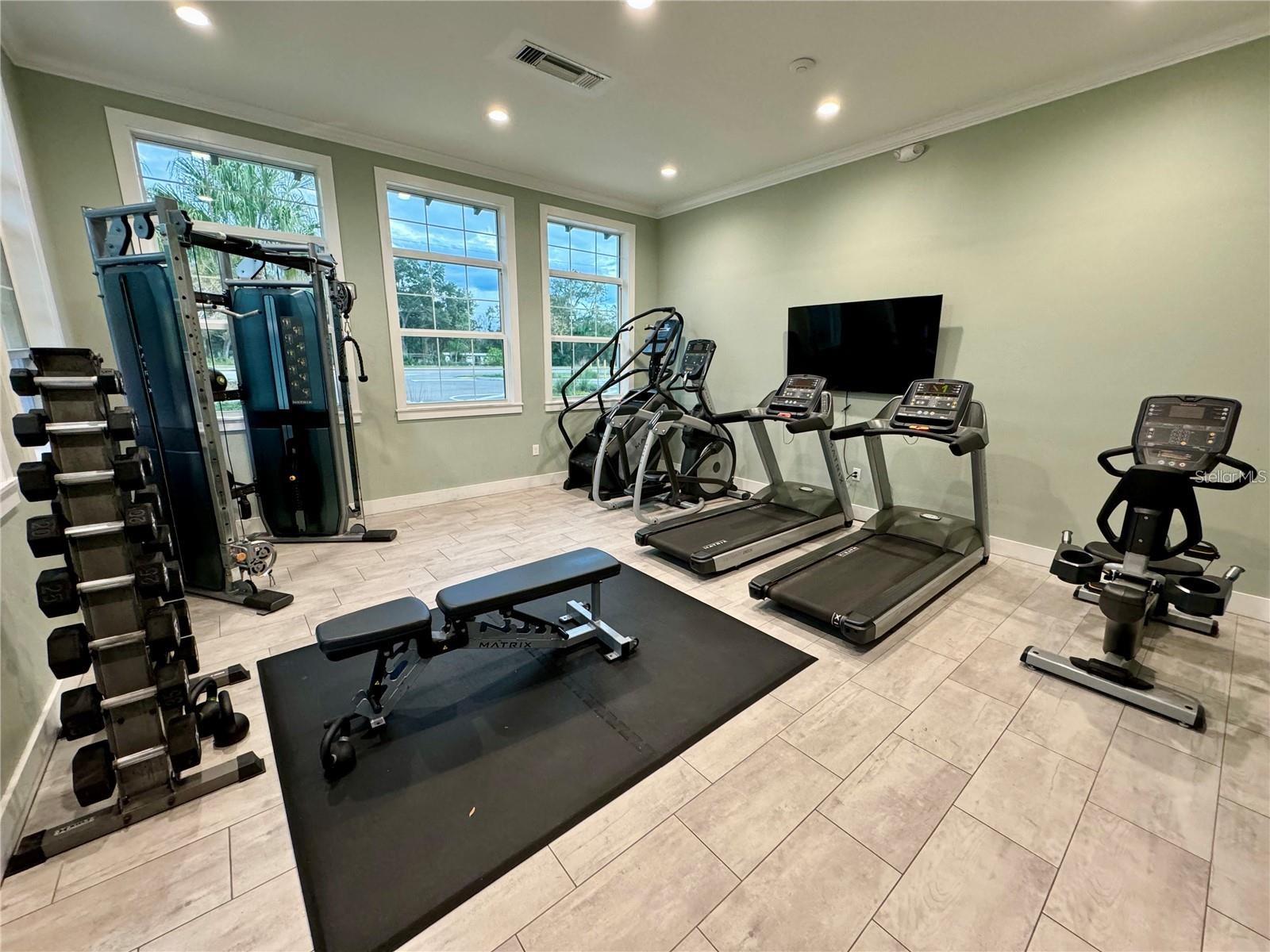 No more gym membership fees!  HOA includes access to this gym at the Sanctuary Clubhouse.