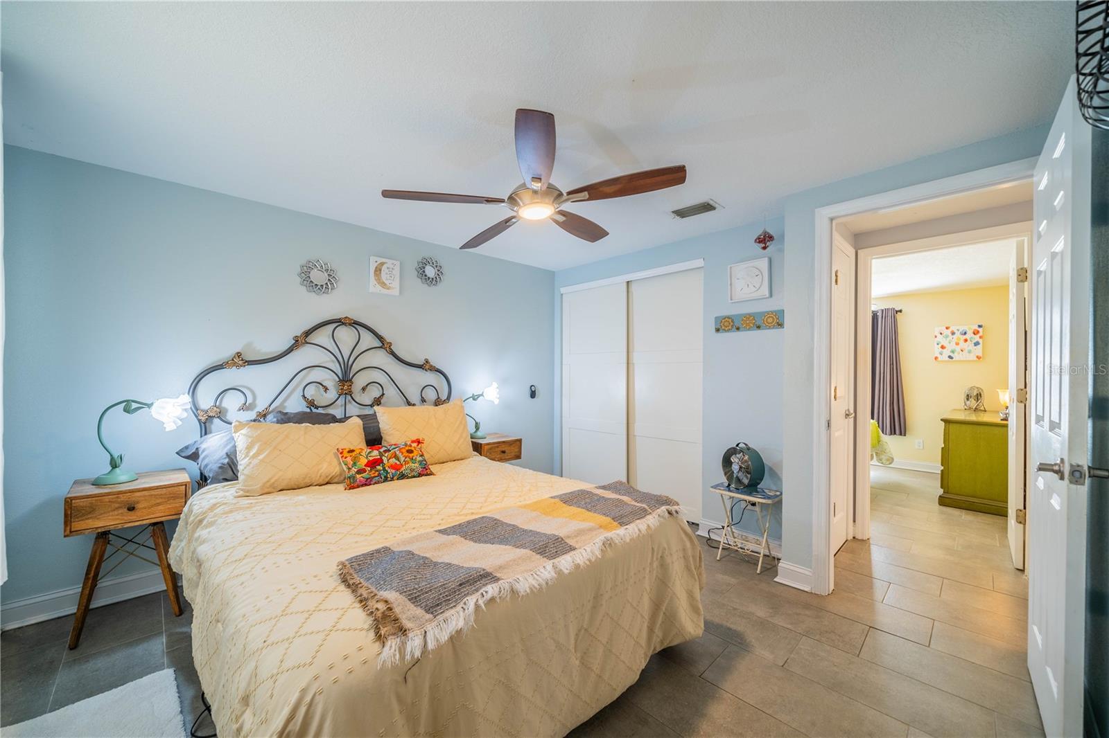 BARN DOORS ON CLOSET OF THE PRIMARY BEDROOM