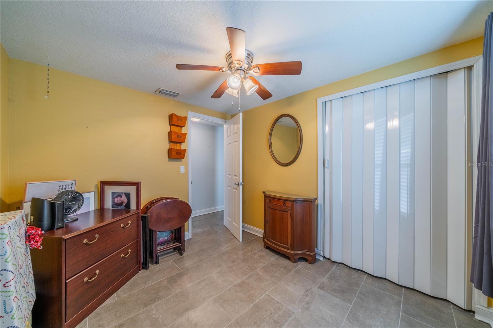 THIRD BEDROOM IS ALSO TILED WITH FAN