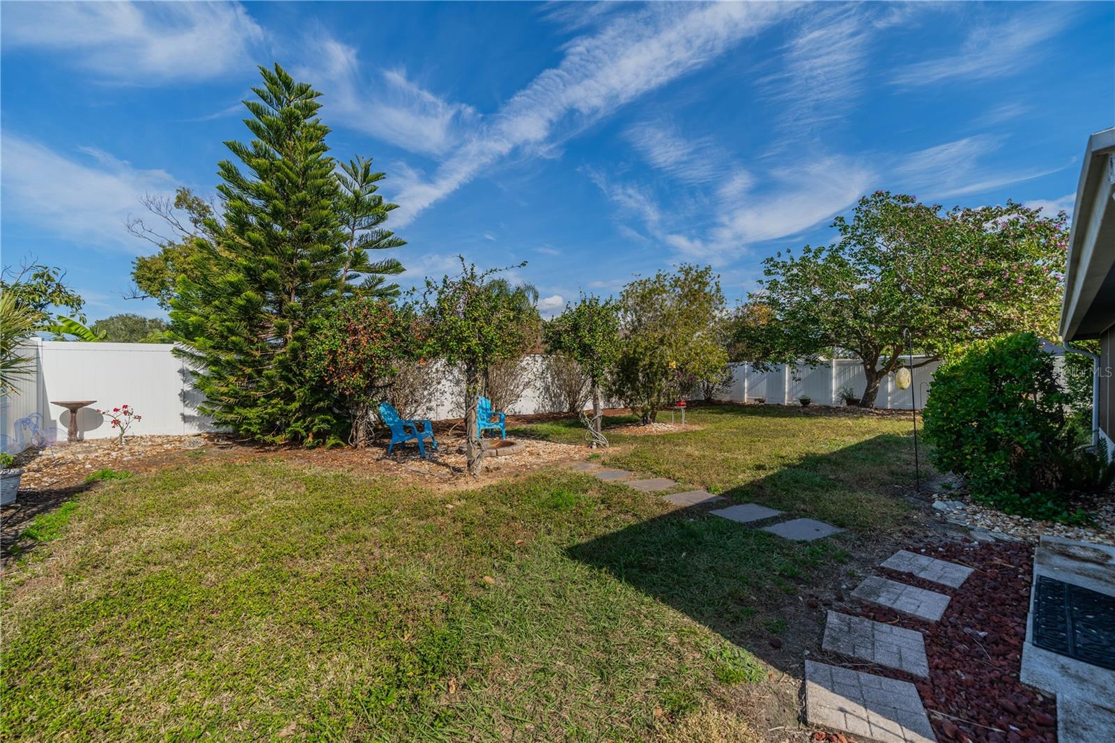 NICELY LANDSCAPED, COMPLETELY FENCED BACK YARD