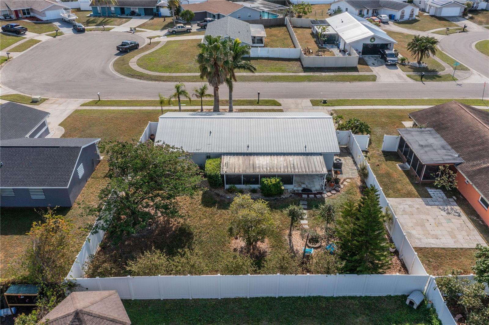 DRONE VIEW OF CUL-DE-SAC AND BACK OF HOME