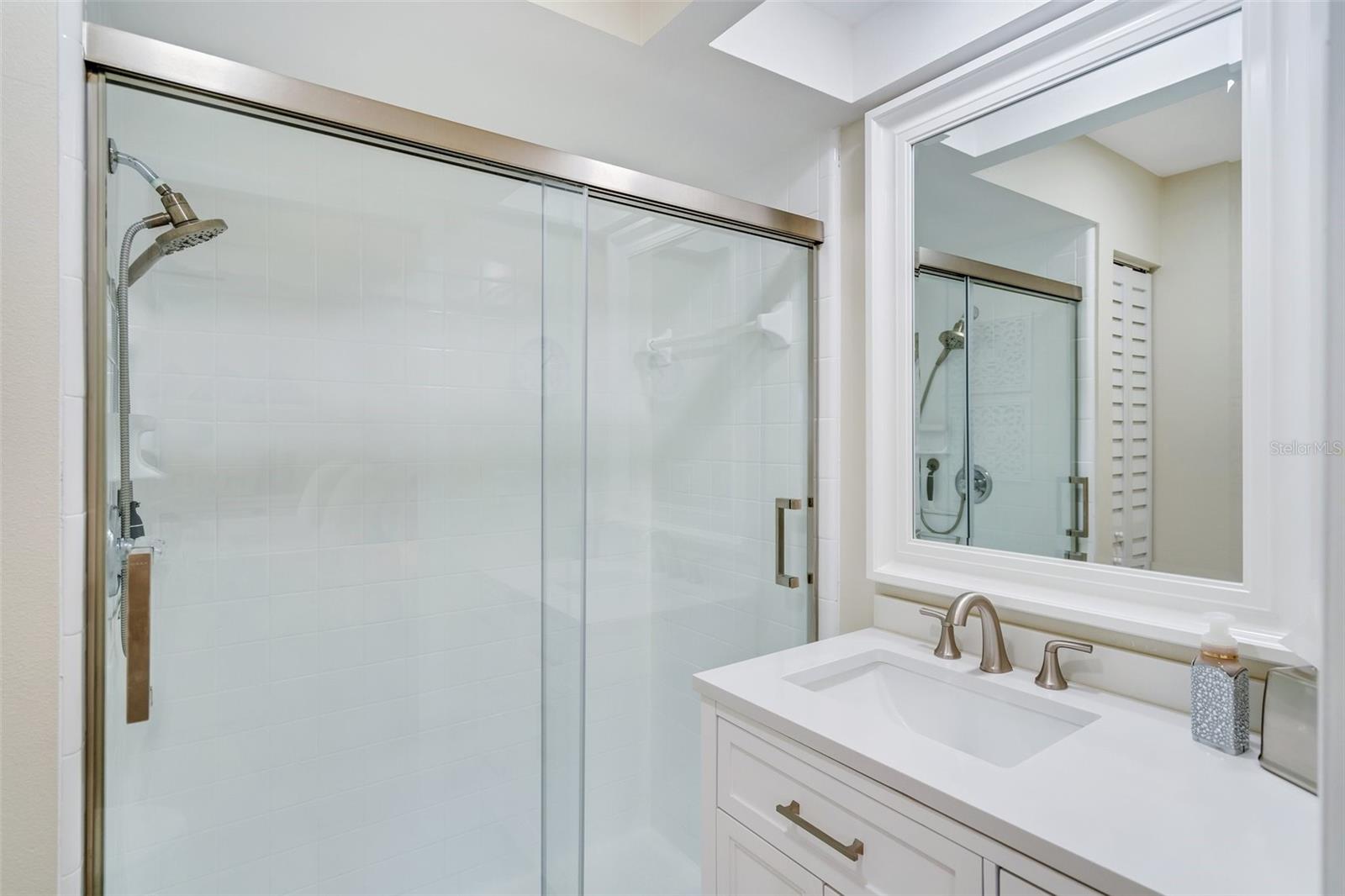 Updated en-suite with walk-in shower & newer vanity~