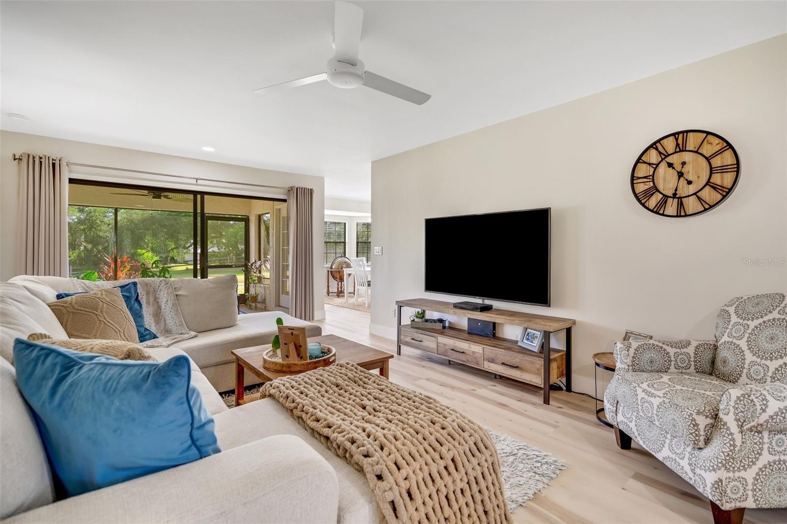 Gorgeous luxury vinyl plank flooring, neutral colors with a coastal vibe, & not a speck of popcorn ceiling~