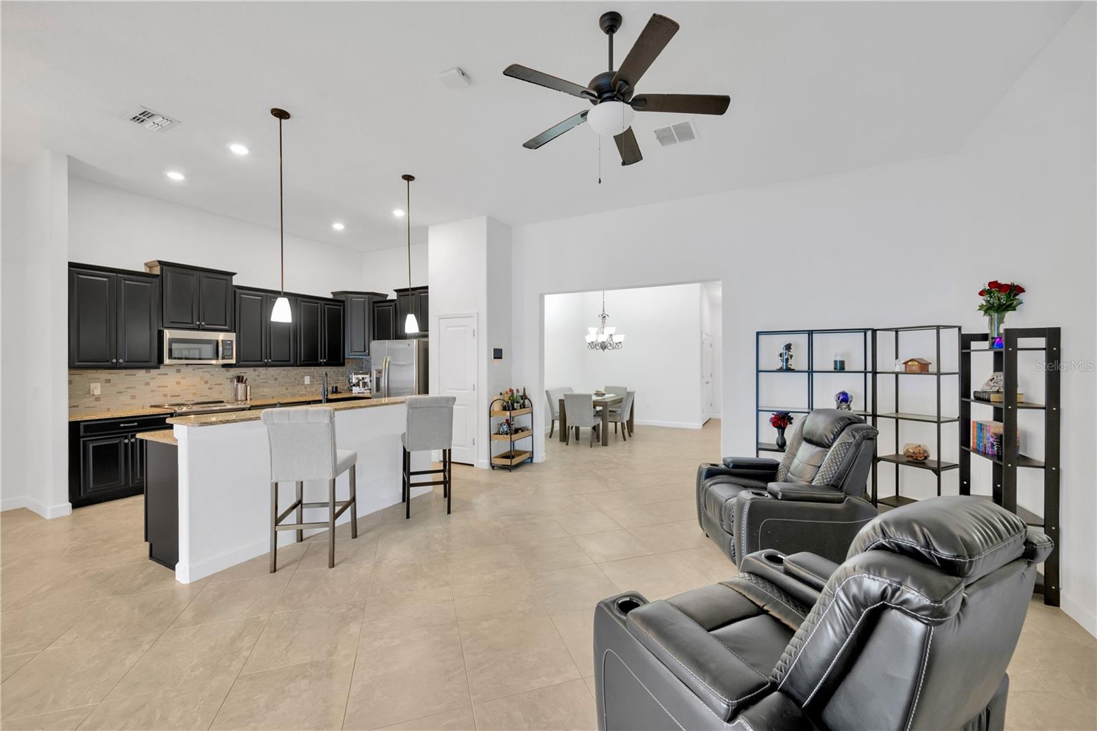 Seamless connection between the kitchen, breakfast nook and family room.