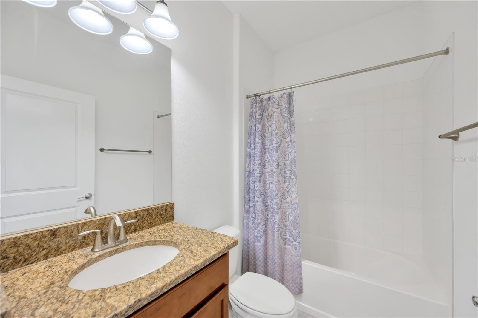 Bathroom #2 with tub/shower combination.