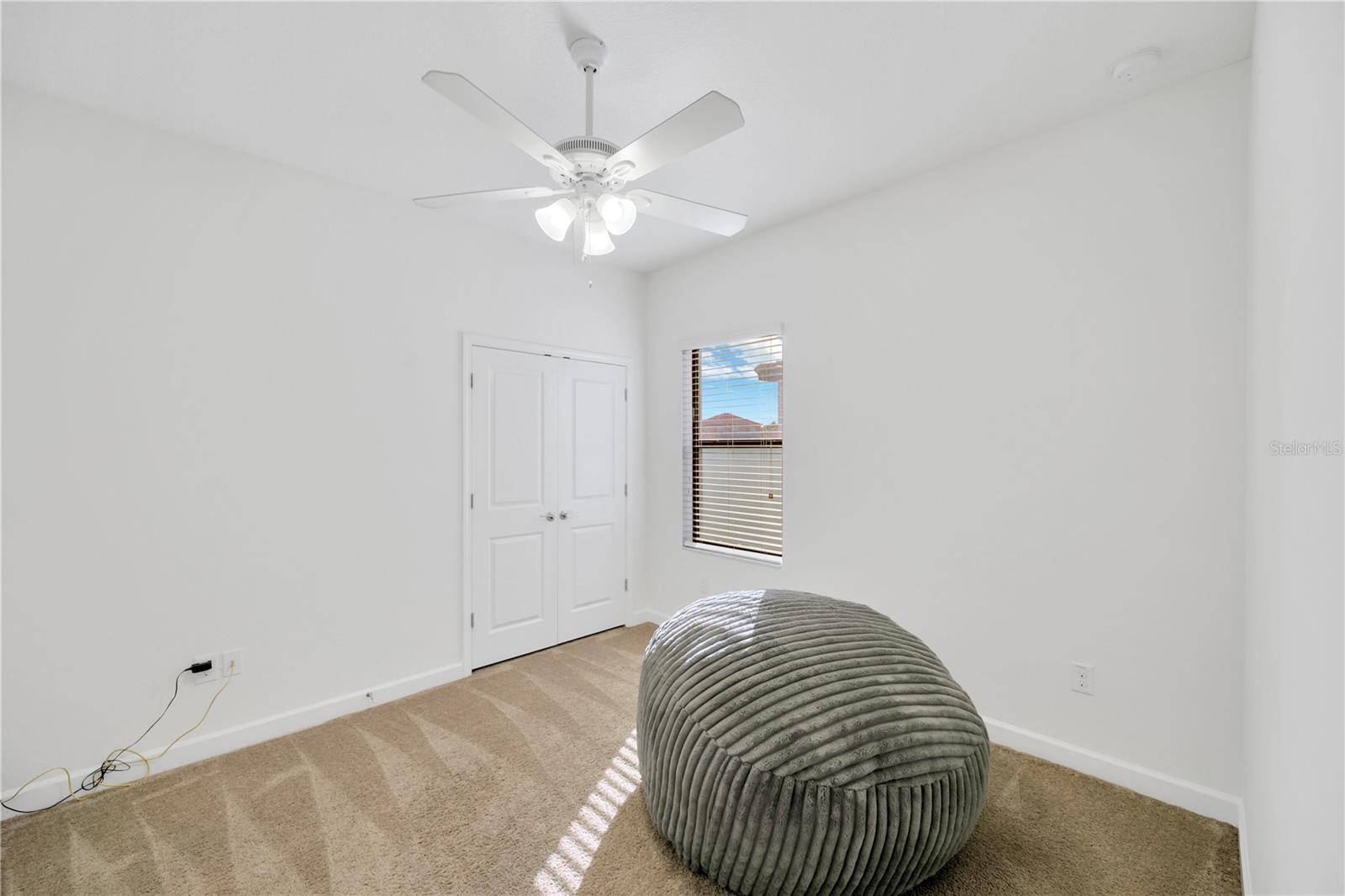 Bedroom #3 is 12' x 13' with carpet, ceiling fan, and built in closet and has access to a full bathroom #2.