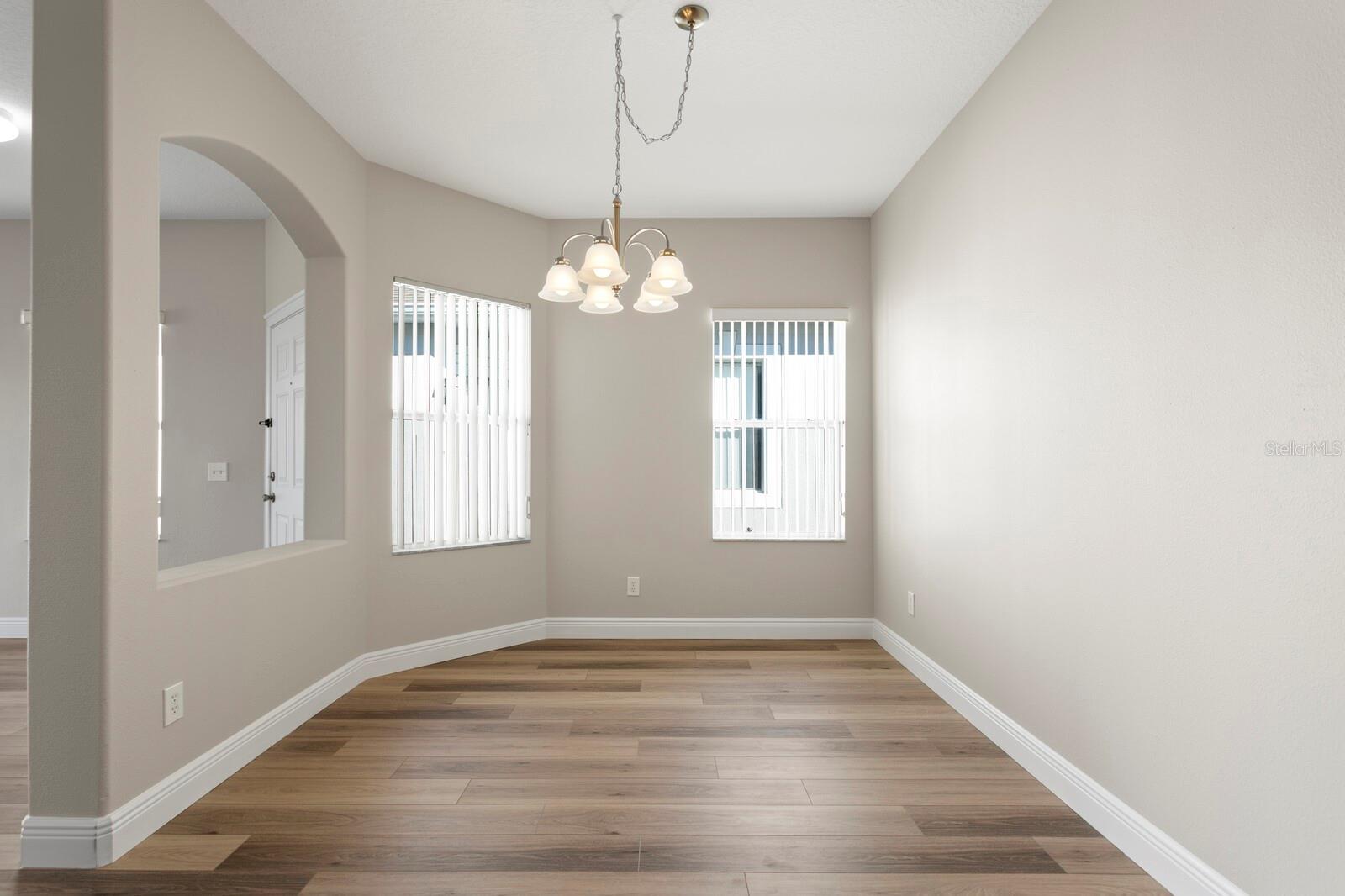 Formal dining room has great natural lighting