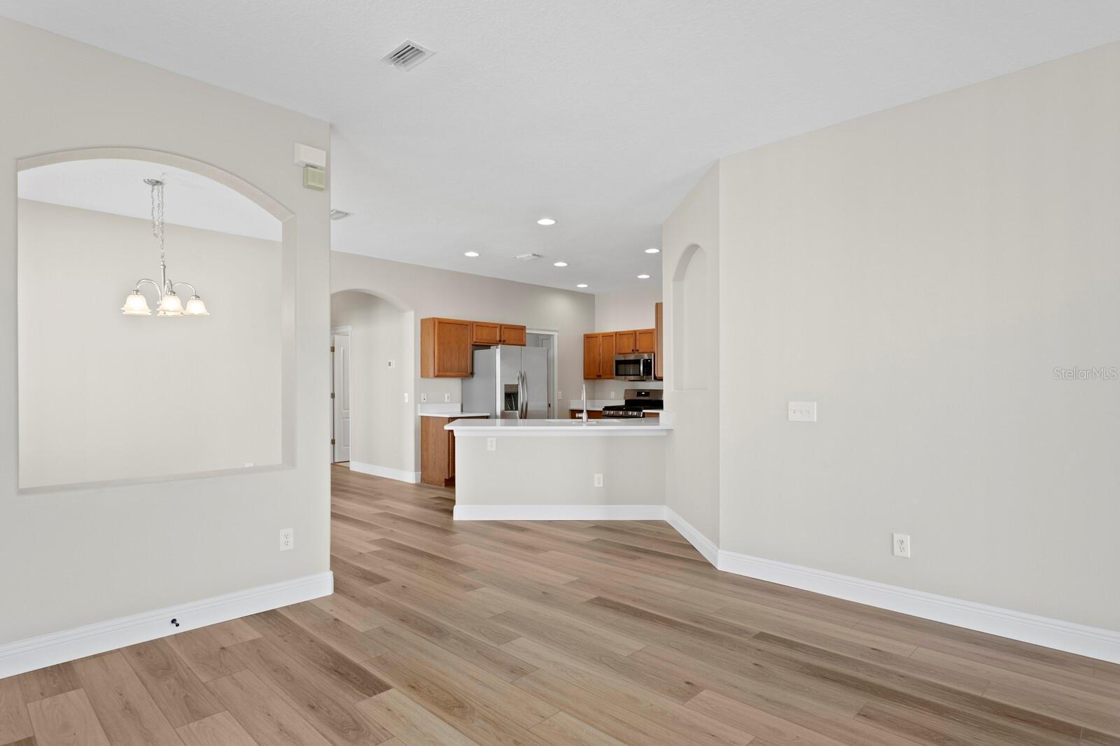 Views from the living room towards the kitchen and dining room