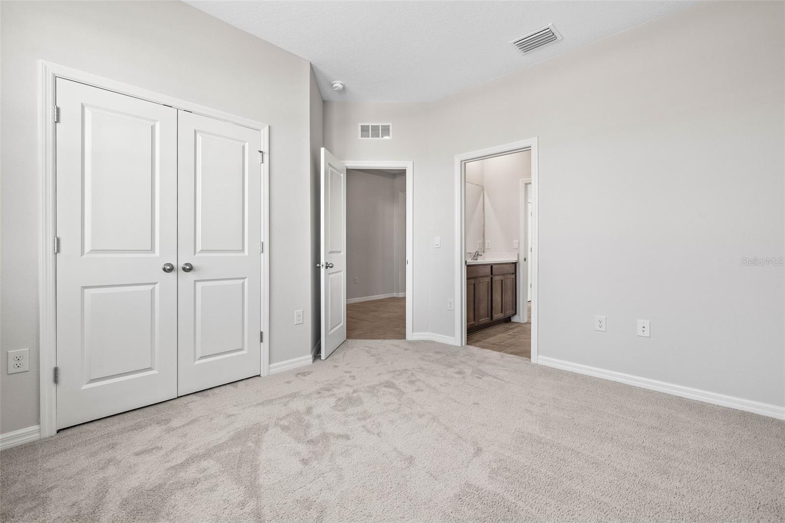 Bedroom 1 with ensuite bath