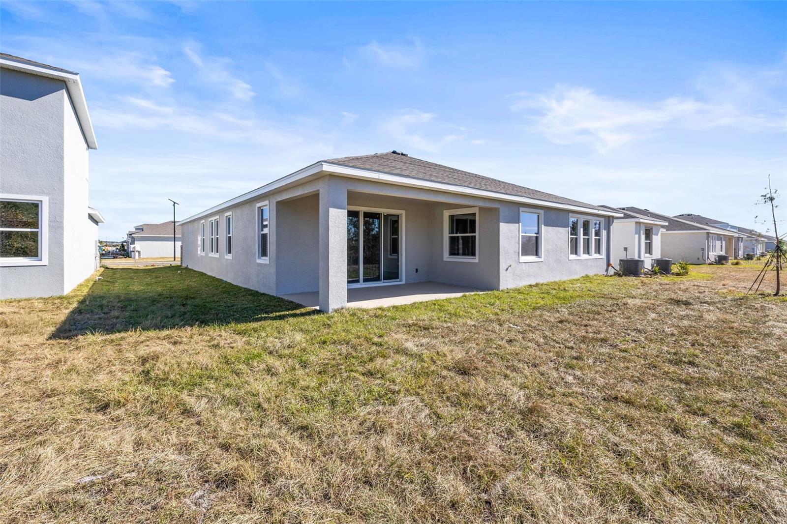 Can be fenced in; partial fence along the back will be constructed by builder