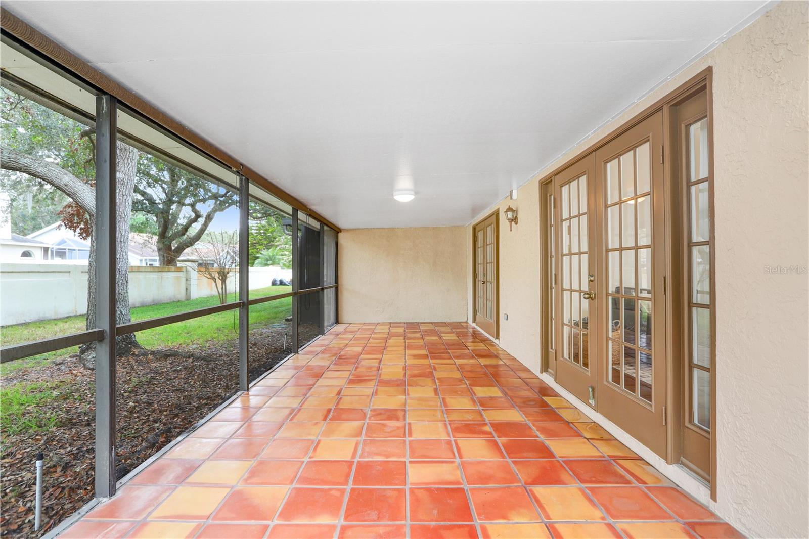 French doors lead to the family room + the primary suite