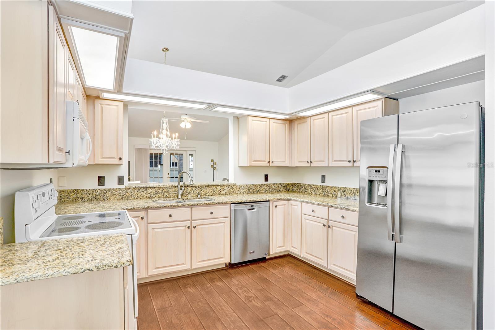 The pass through window is a thoughtful feature in the kitchen