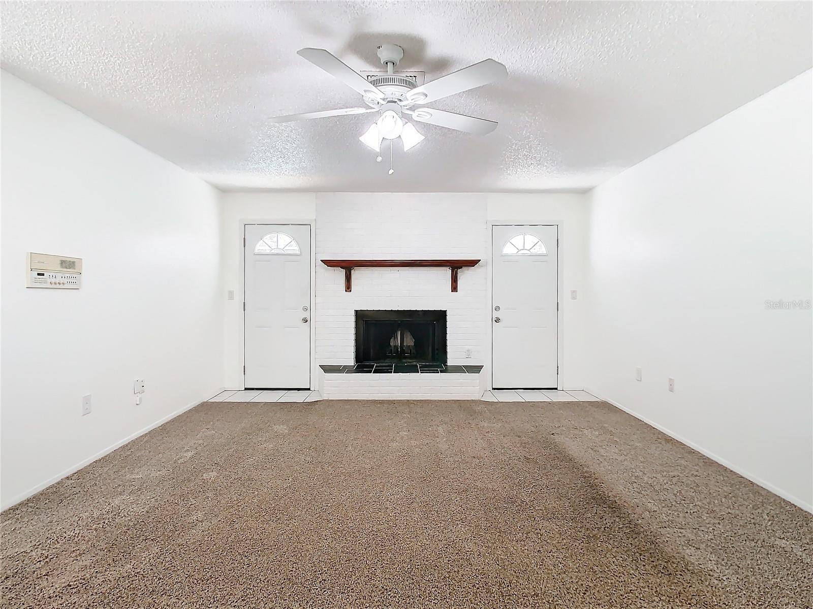 Family Room with Wood Burning Fireplace