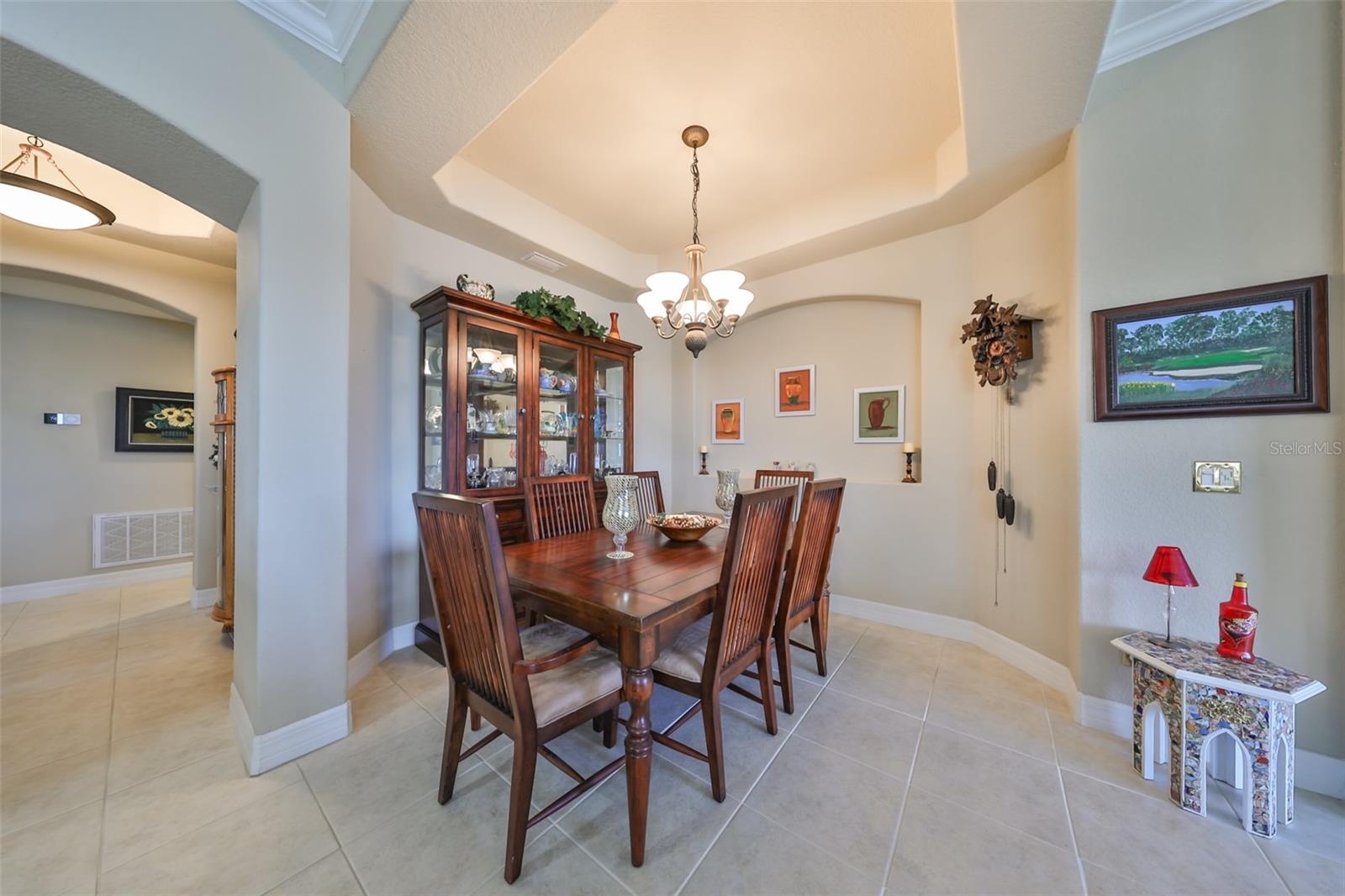 The dining area is jsut the right size for an intimate setting.  The architectural feature offers an elegant touch to the space.