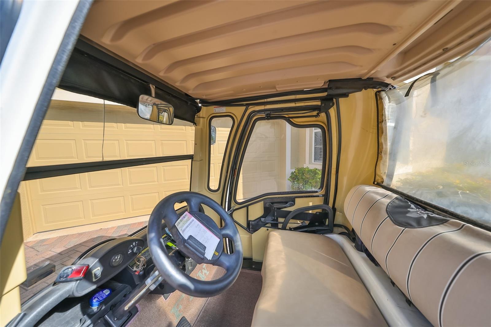 Golf cart CONVEYS with the sale of the home.