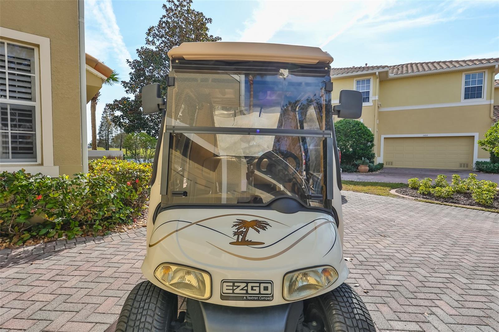 Golf cart CONVEYS with the sale of the home.