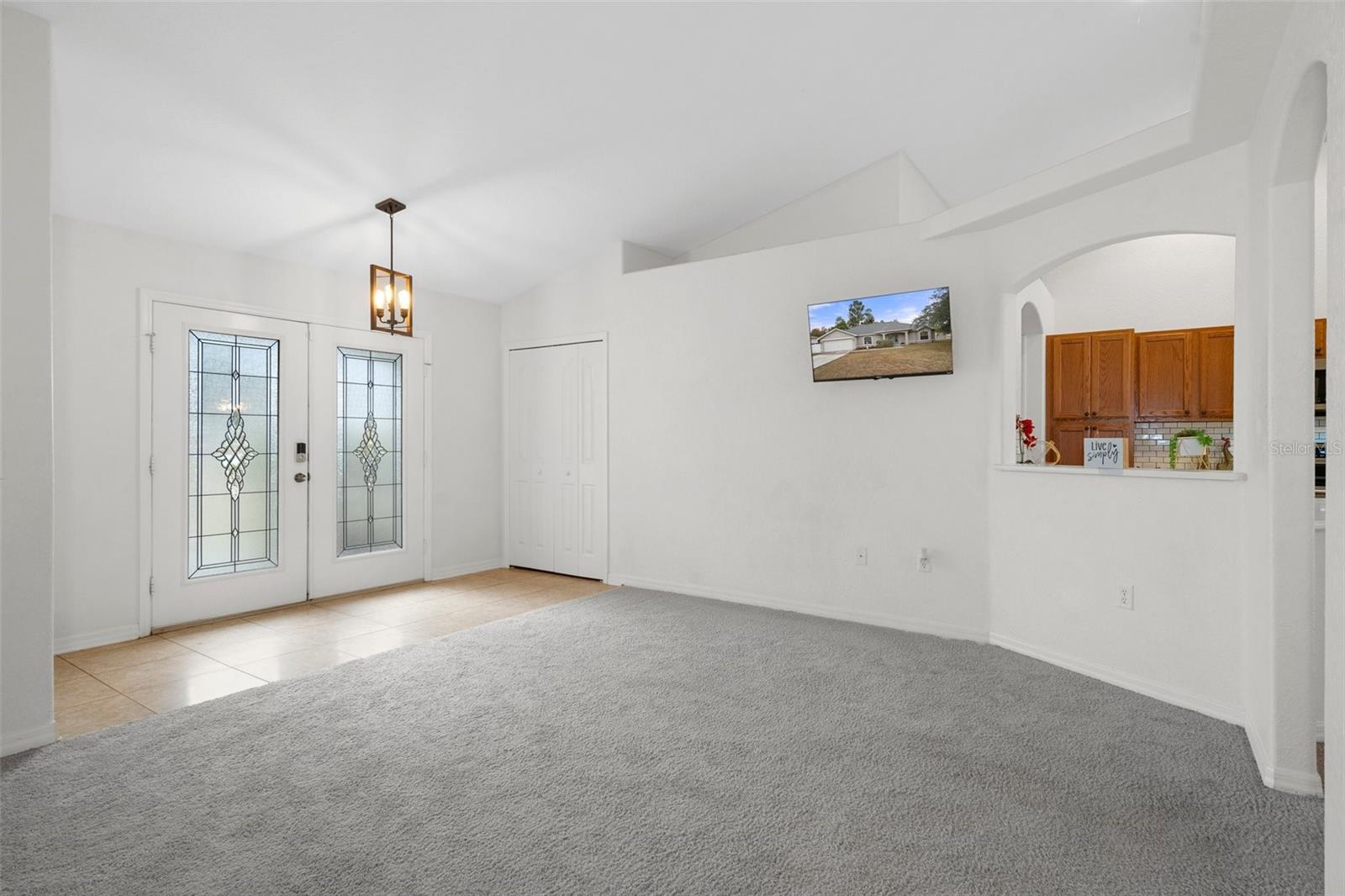 Lovely Foyer and Spacious Living Room