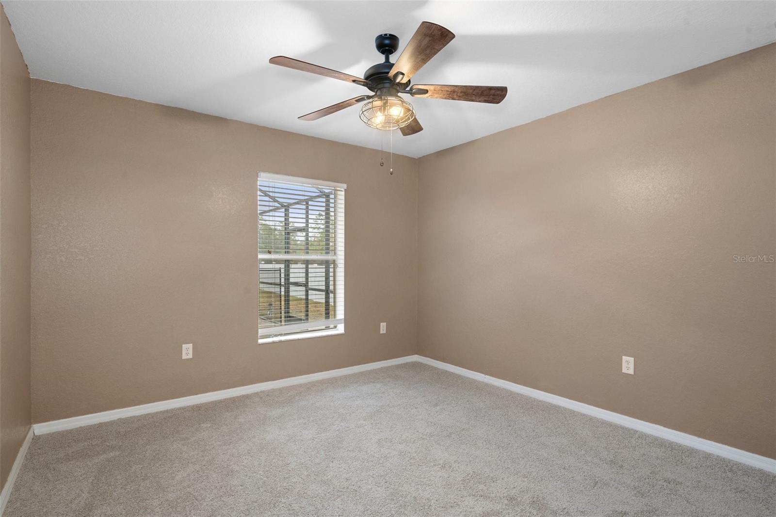 Bedroom One has a fan/light