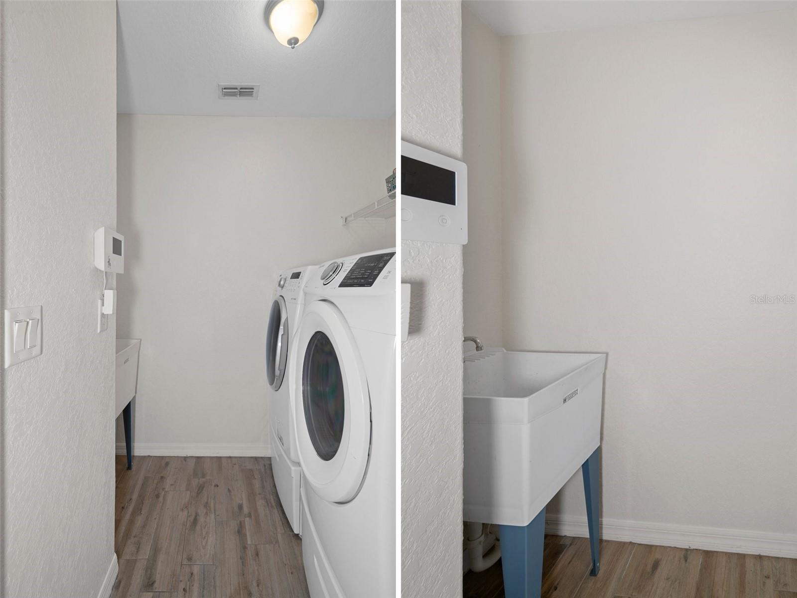 Spacious Laundry Room with a sink