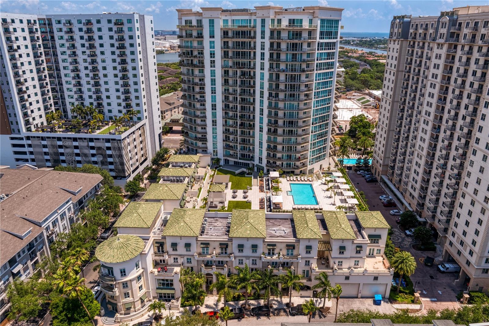 The Palm Court amenity level which features resort style heated infinity pool with hot tub, and pool-side cabanas.