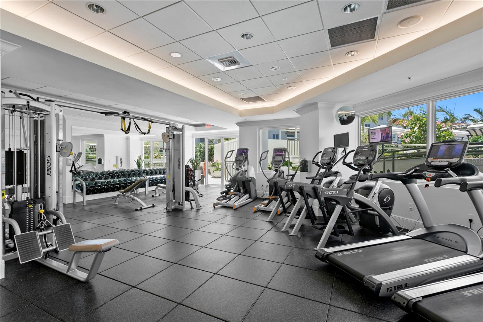 Fitness center completed with cardio, circuit and free weights and separate his/hers locker rooms and a treatement room