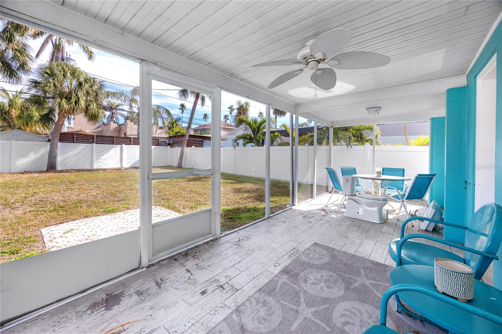 Covered back porch to enjoy those warm Florida evenings.