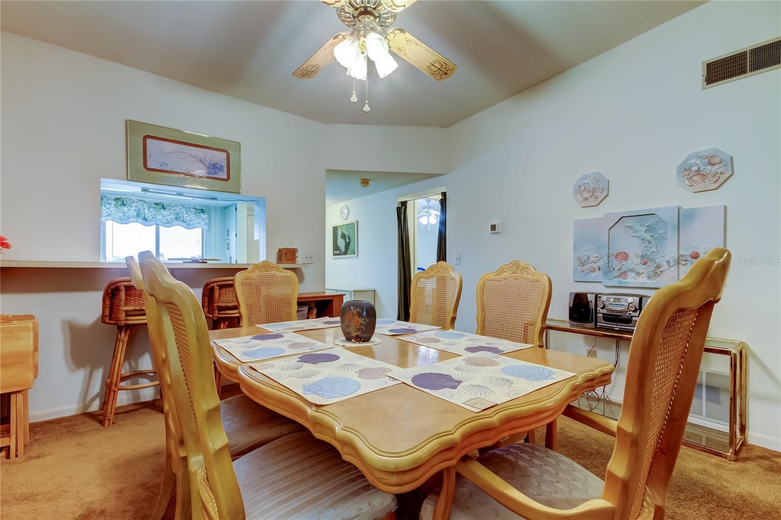 26. Dining Room (9' x 12') is Currently Housing a 6-Person Dinette & Full Size Hutch w Upper Curio Cabinet..