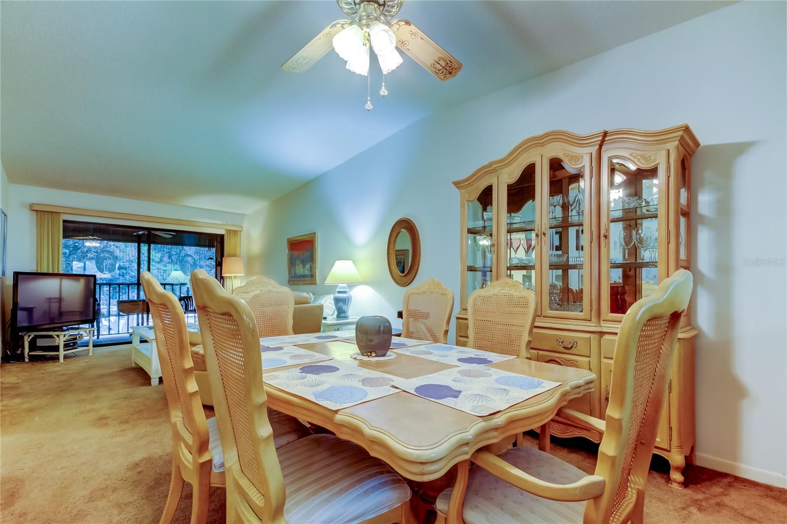 28. Dining Area is Spacious (9' x 12') - Currently Housing a 6 Person Dinette & Full Size Banquet Cabinet w Curio Top!